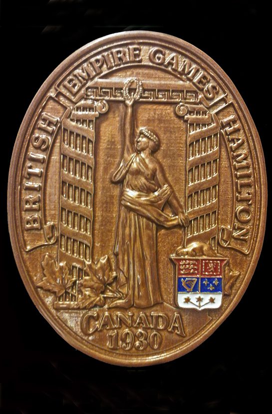 British Empire Games oval medal with Greek Ionic Pillars and the Goddess of Victory with laurel wreath.