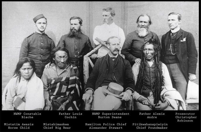 Nine of the participants in the North West Rebellion sit for a photo.