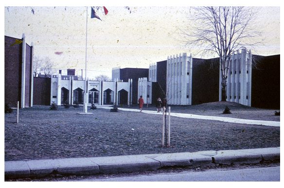 Street view of Bennetto replacement building with modern architectural attributes and materials.