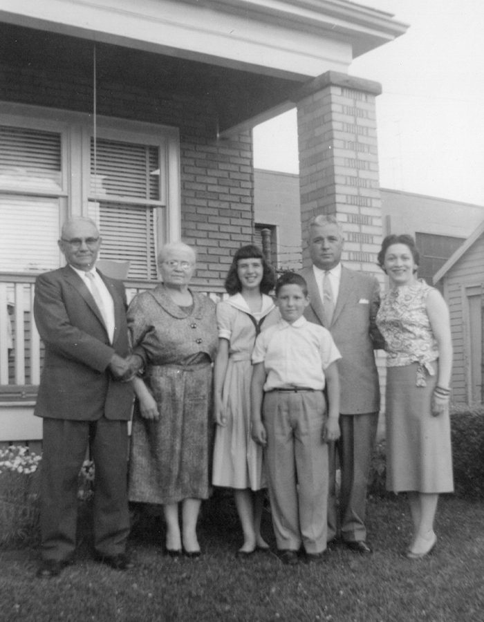 Six family members in front of their home at 42 Leeds.