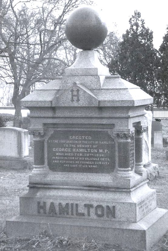 The resting place of George Hamilton is marked by a boxy tombstone over 4 metres high capped with a sphere.