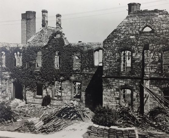 Hamilton Collegiate two story stone building reclamation of building materials and demolition.