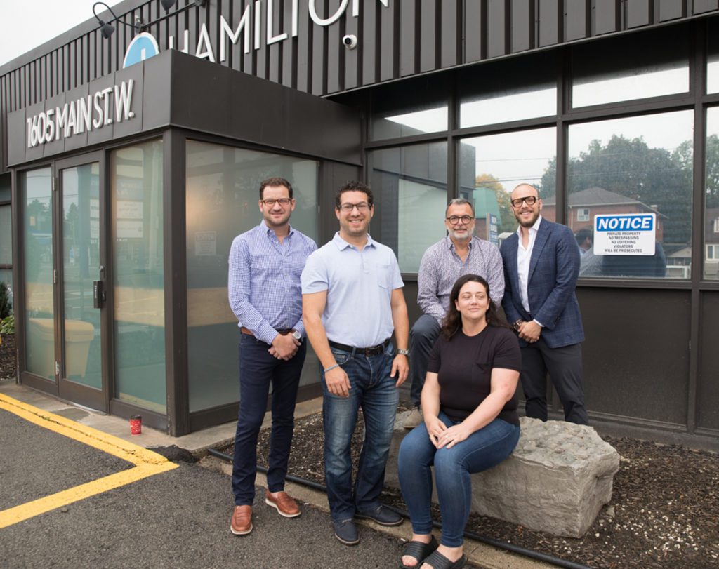 Hamilton Jewish Federation, five people pose outside 1605 Main Street West.