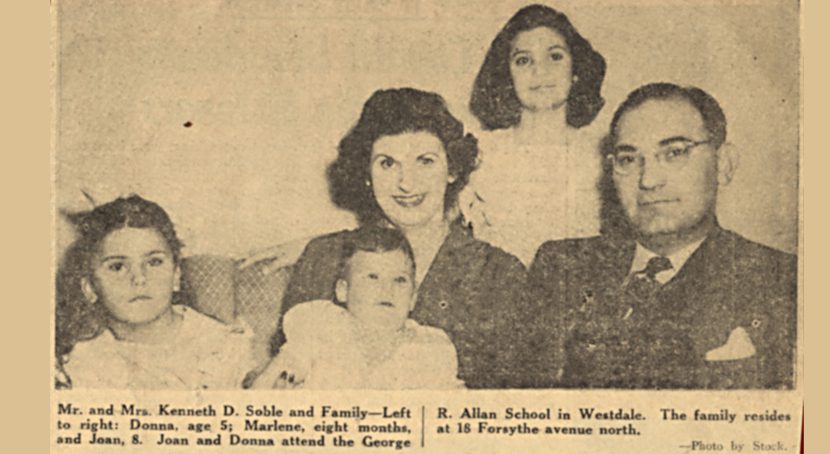 Newspaper clipping of family with children who attend George R. Allan School.