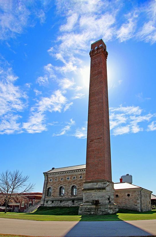 Victorian water pumping station made of limestone with its one hundred fifty foot brick chimney.