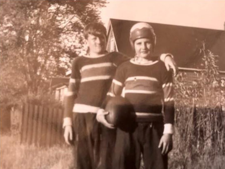 Two boys in their football gear 1951.