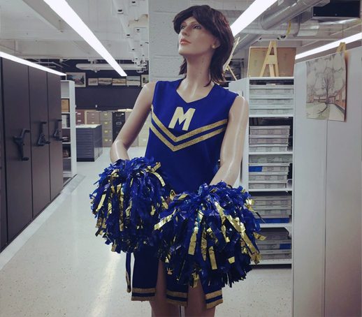 Educational Archives female mannequin wearing a cheerleader uniform.