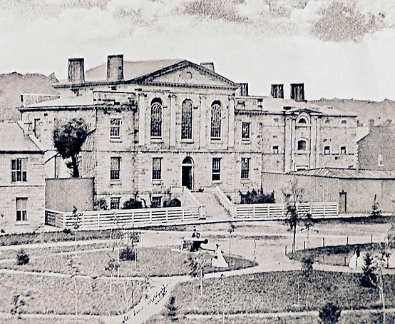 Large Georgian-style building with formal pathways.