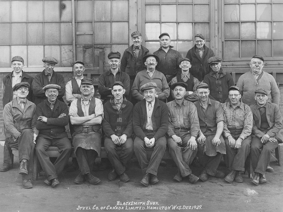 Twenty men from Brightside outside Stelco's Blacksmith Shop 1939 .