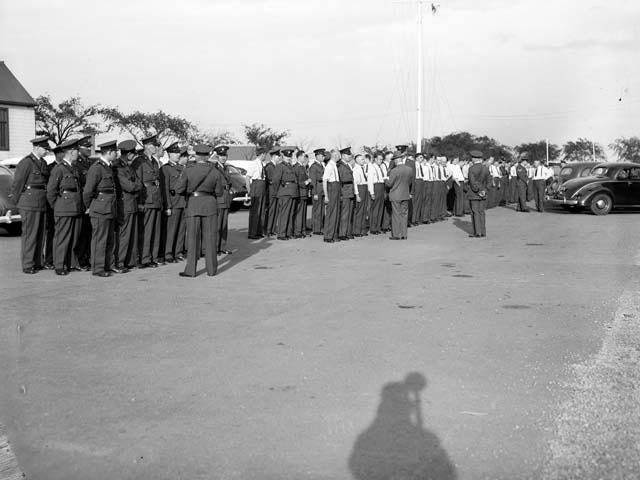 Many police officers standing in formation during strike.