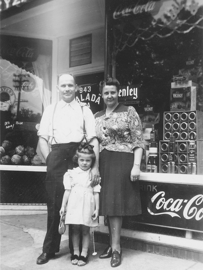Family in front of their store at 943 Burlington Street 1940.