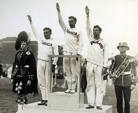 Empire Games podium photo, Canada wins gold and silver, England bronze .