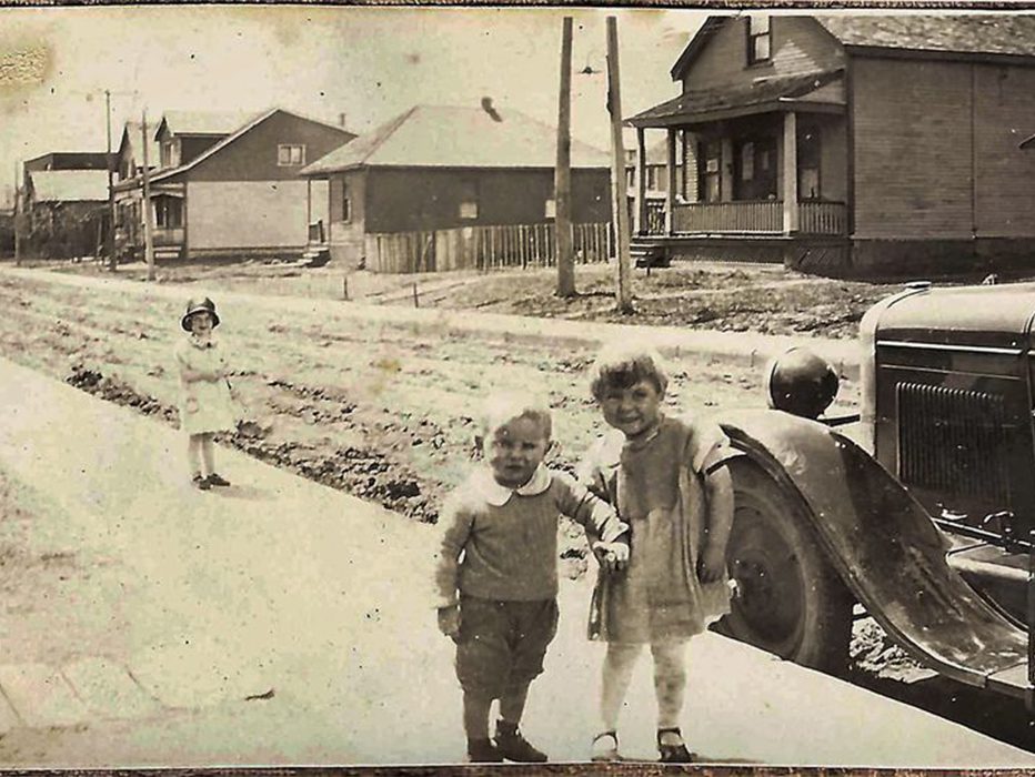 Three young children on Lancaster Street.