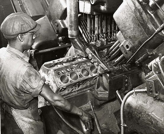 A worker in an auto factory.
