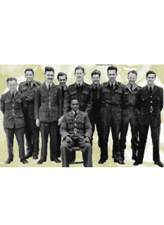 Nine soldier stand behind one soldier seated in a chair,