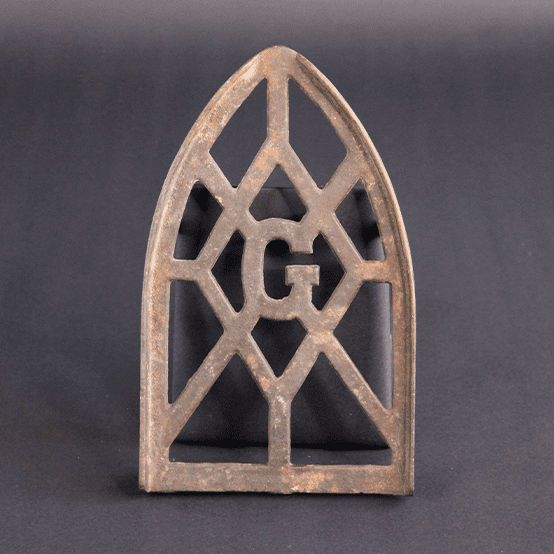 A pressing iron trivet stand.