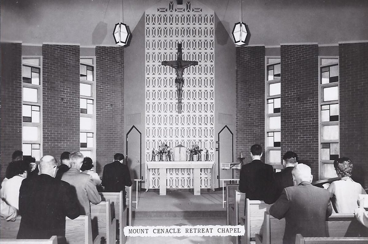 Interior of the Mount Cenacle Retreat Chapel with people seated in the pews